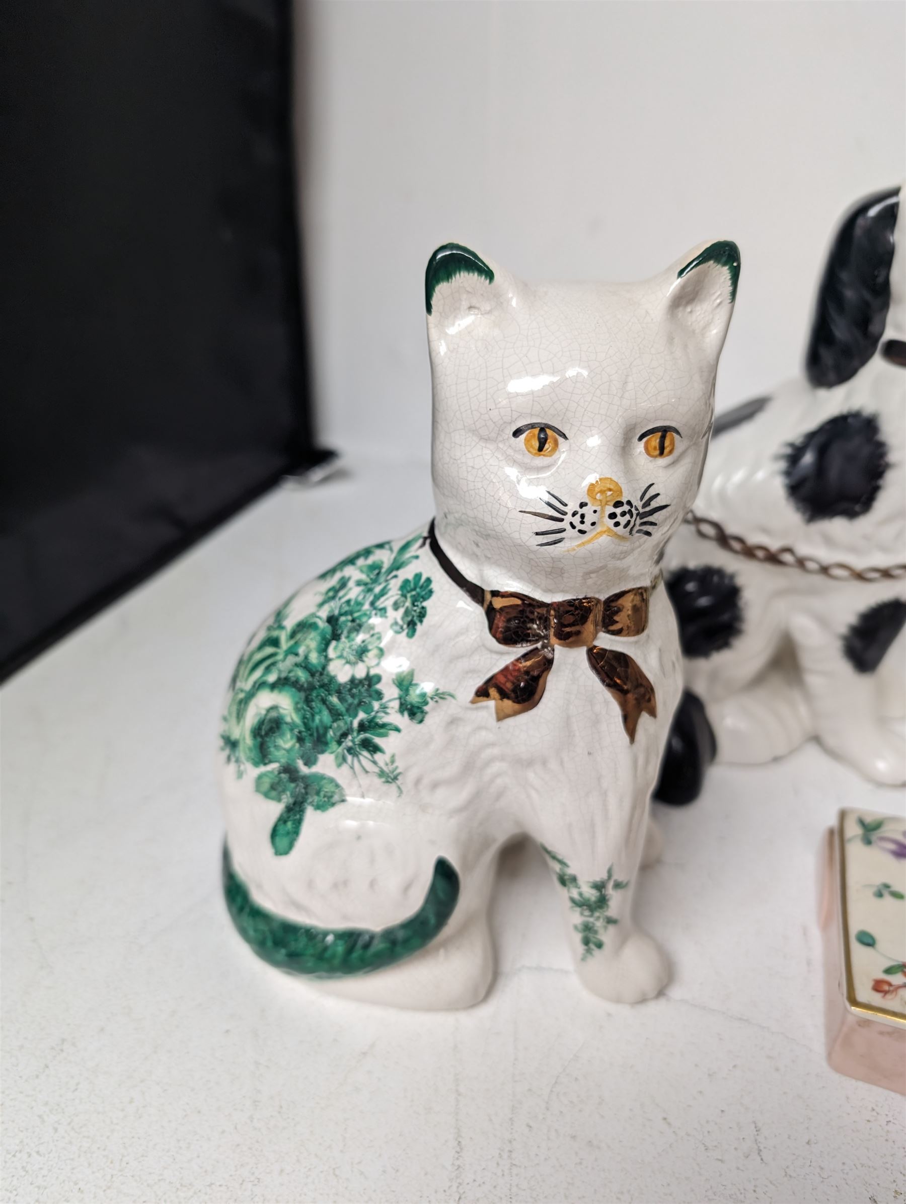 Pair of Staffordshire style dogs, together with a pair of Staffordshire style cats and a Clarice Cliff for Royal Staffordshire floral trinket box