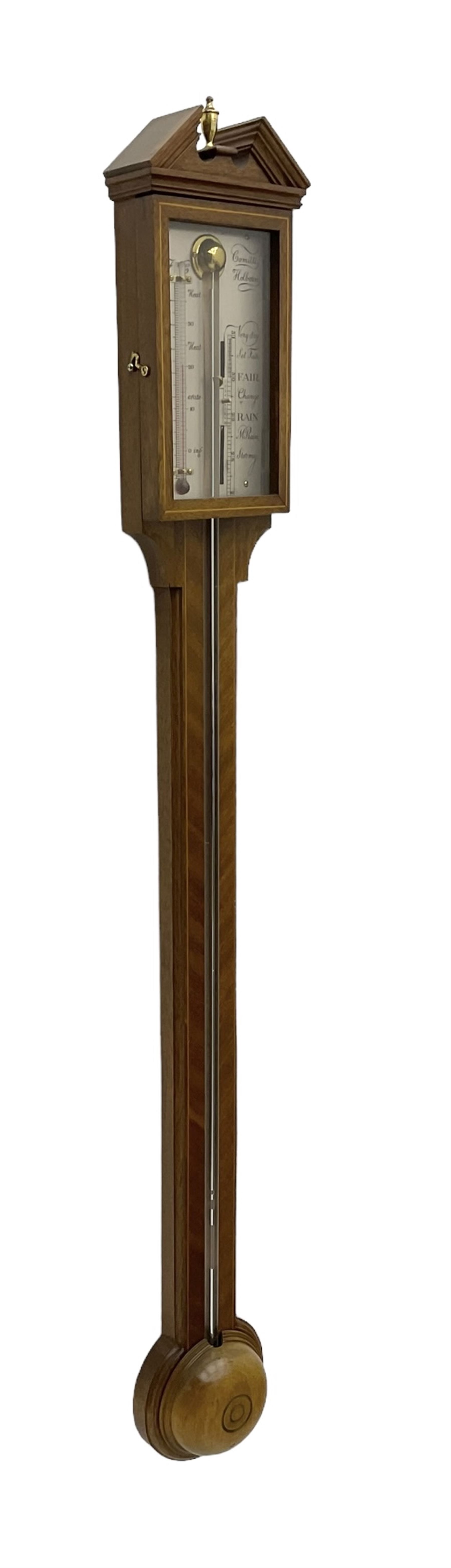 Commiti - 20th century Mercury stick barometer in the 18th century style, with a broken pediment and brass finial, silvered register with a spirit thermometer and vernier gauge within a glazed door, visible cistern tube and circular cover to the base.