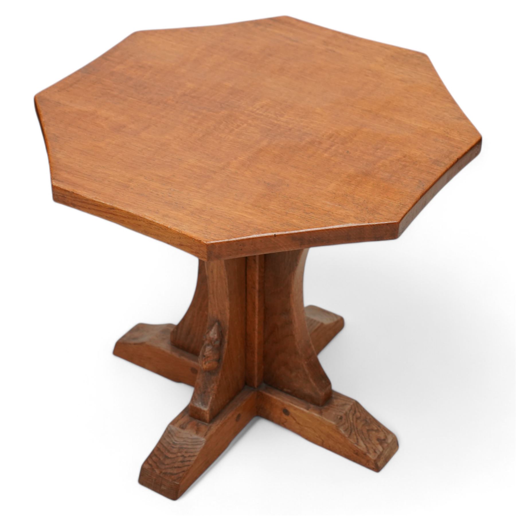 Mouseman - oak coffee table, octagonal adzed top on cruciform base and sledge feet, carved with mouse signature, by the workshop of Robert Thompson, Kilburn  