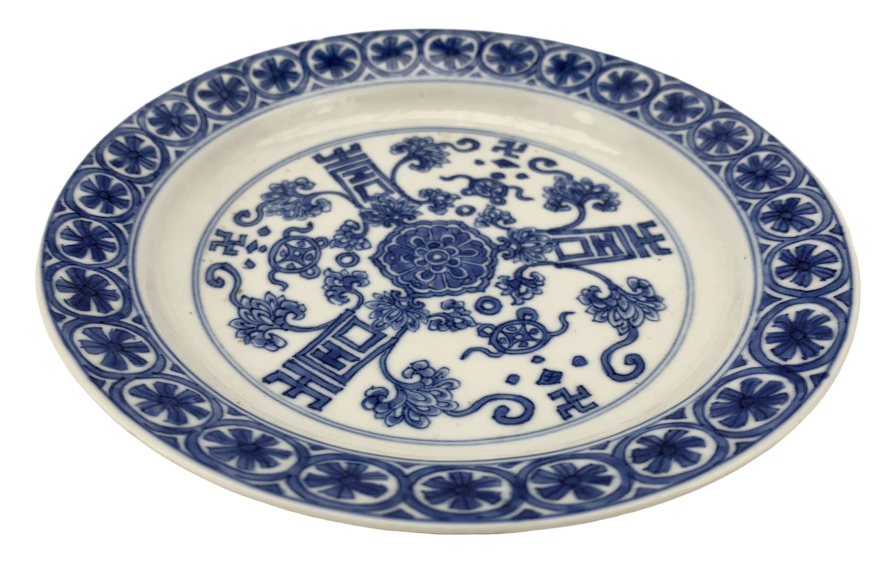 Chinese porcelain dish, Kangxi period, decorated with three shou characters divided by flowers, ribbon tied cash and swastikas, the border with flowerheads in roudels, six character Chenghua mark beneath, D16.5cm 