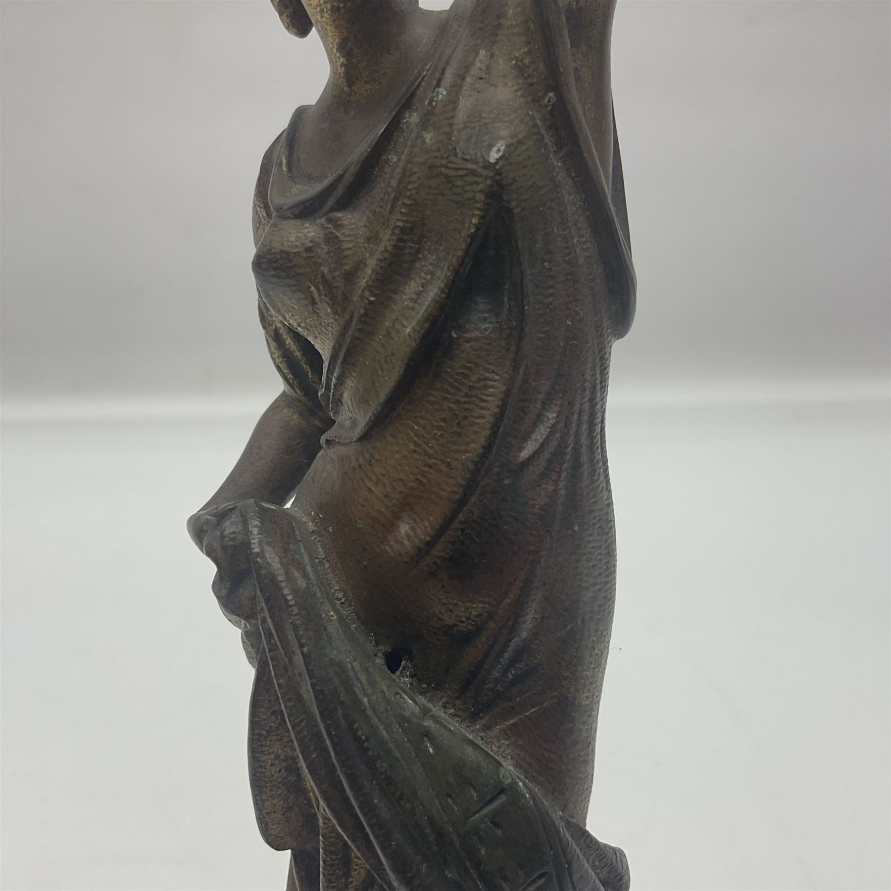 Gilt bronze figure of a lady in neo-classical dress, on a circular wooden plinth, H26cm