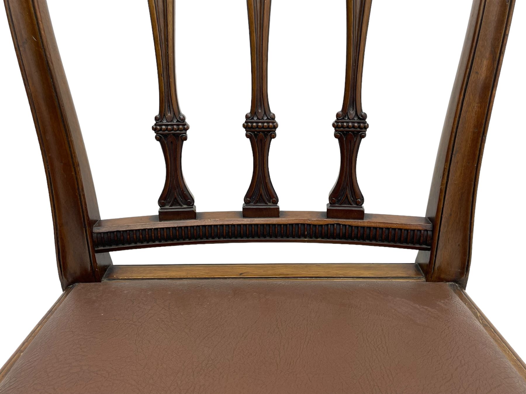 Set of six early 20th century Hepplewhite design mahogany dining chairs, moulded arched frame back, three shaped vertical rails carved with stylised foliate decoration, drop-in seats upholstered in brown fabric within moulded seat rails, on acanthus leaf carved cabriole supports with paw carved terminals 