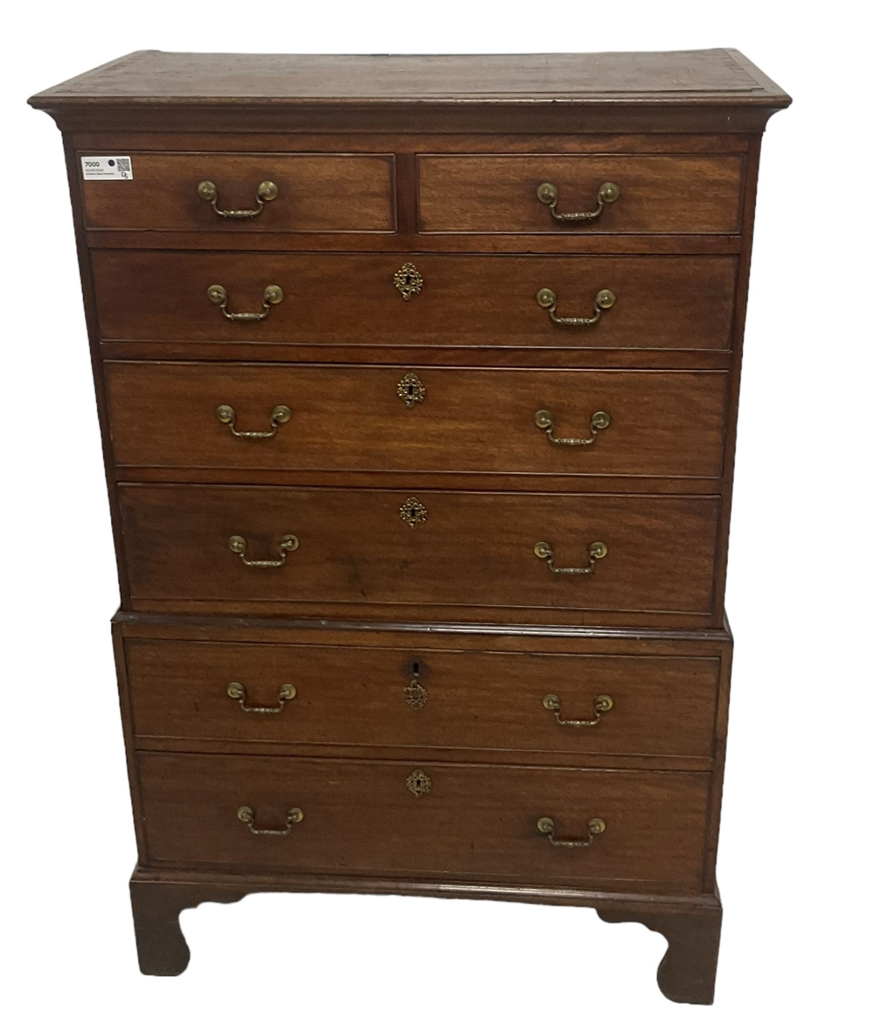 George III mahogany chest-on-chest, projecting cornice over two short and five long graduating cock-beaded drawers, each fitted with original brass swan neck handles, raised on bracket feet