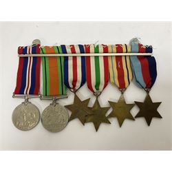 WWII group of six medals comprising 1939-45 Star, The Africa Star, The Italy Star, France and Germany Star, Defence Medal and War Medal 1939-45, awarded to 7899181 RAC C.W Hughes, together with two chevrons and ephemera relating to Charles William 'Bill' Hughes including Soldier's Release Book, photographs, certificates of transfers etc 