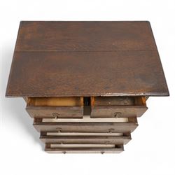 18th century oak chest, moulded rectangular top over two short over three long drawers, beaded circular handle plates and drop handles, on stile supports 