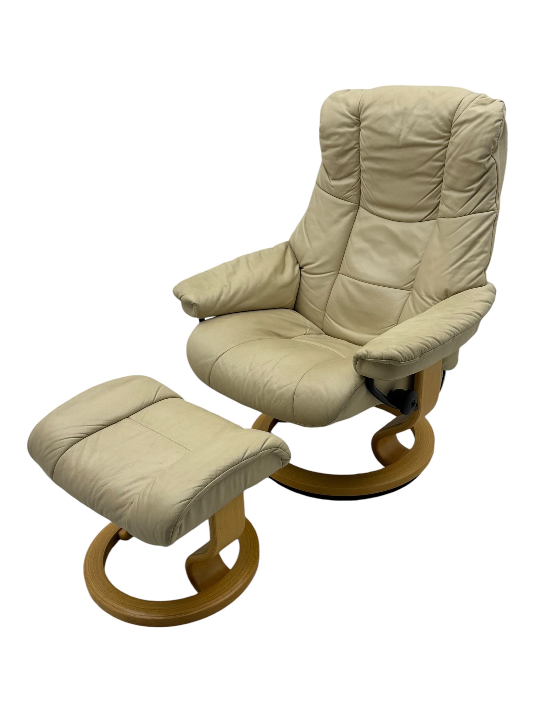 Ekornes Stressless - swivel armchair upholstered in cream leather (W81cm, H103cm); together with matching stool (W49cm)