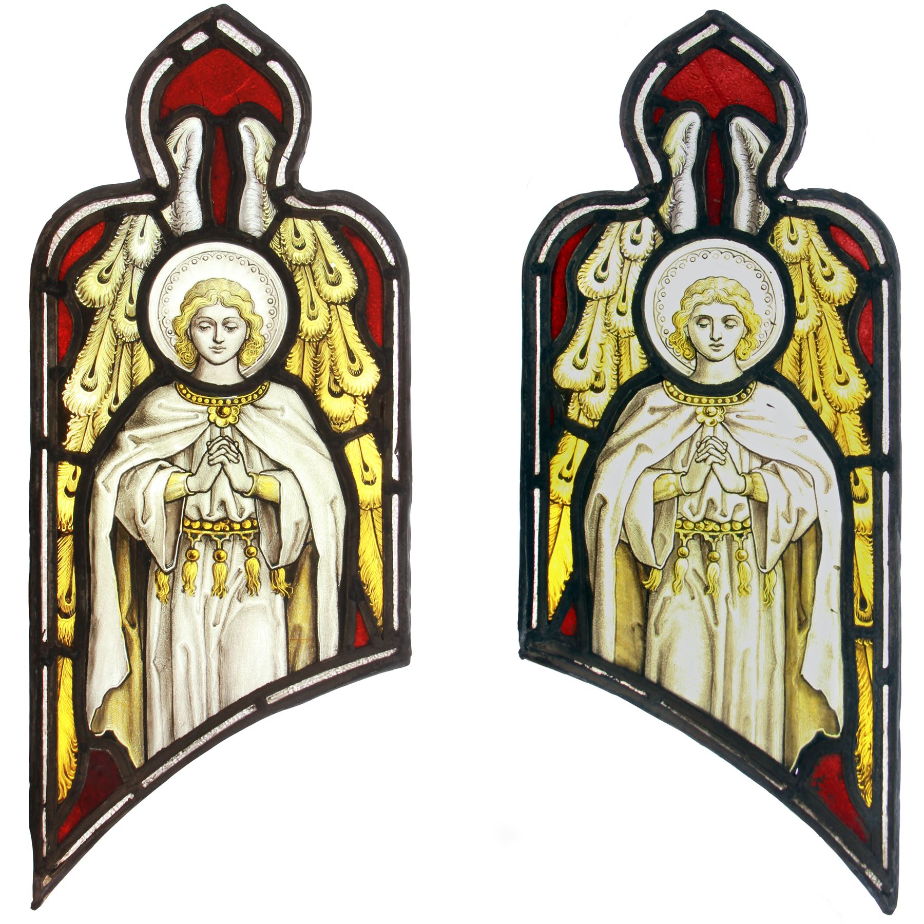 Pair of late 19th/early 20th century leaded stained glass panels, each depicting an angel or saint with hands clasped in prayer in red upon yellow ground, H54cm W23.5cm