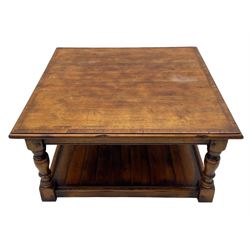 Square elm coffee table, square ovolo-moulded top with fruitwood band, turned supports united by undertier 