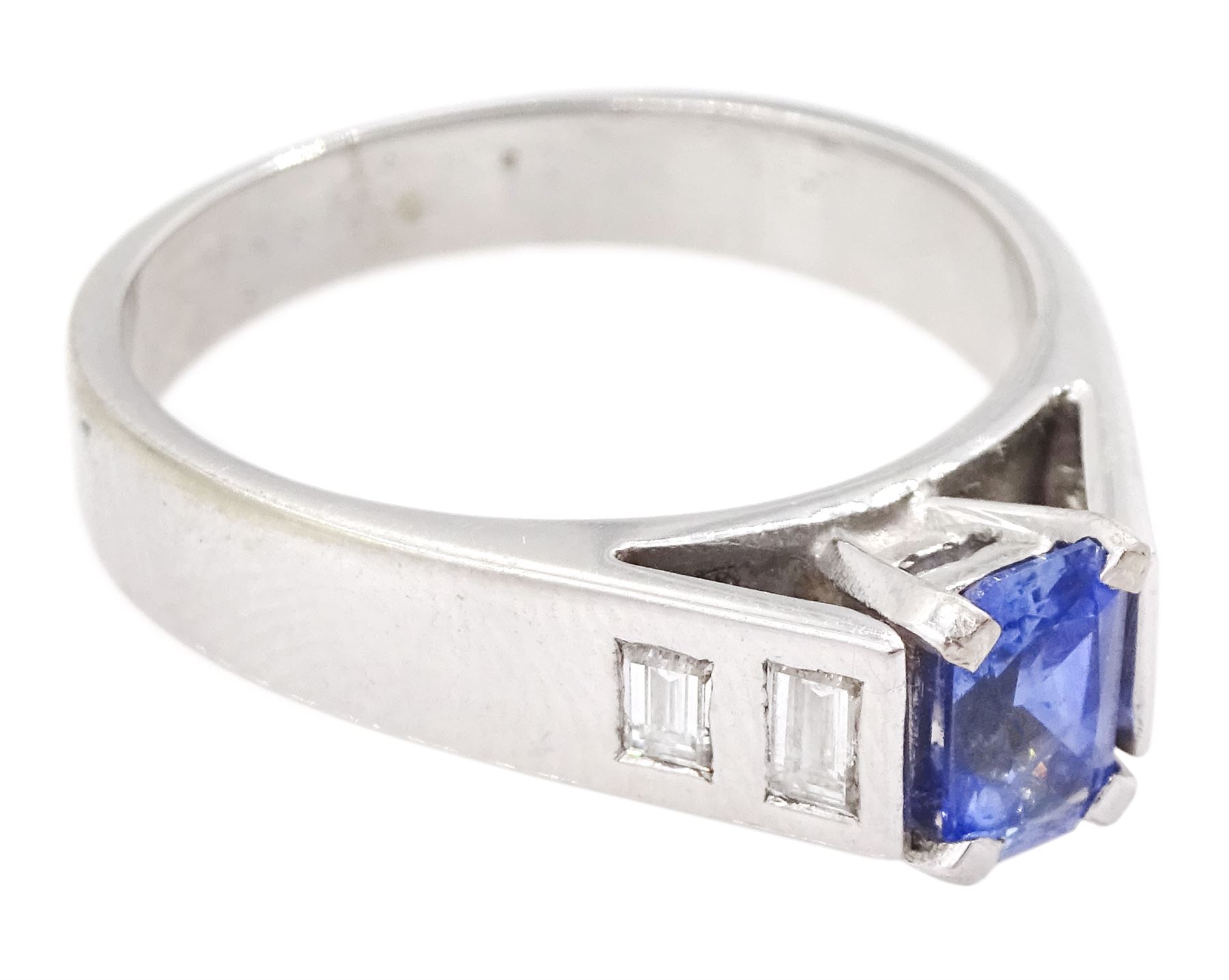 White gold single stone radiant cut sapphire ring, with baguette diamond shoulders, hallmarked 9ct, sapphire approx 0.65 carat