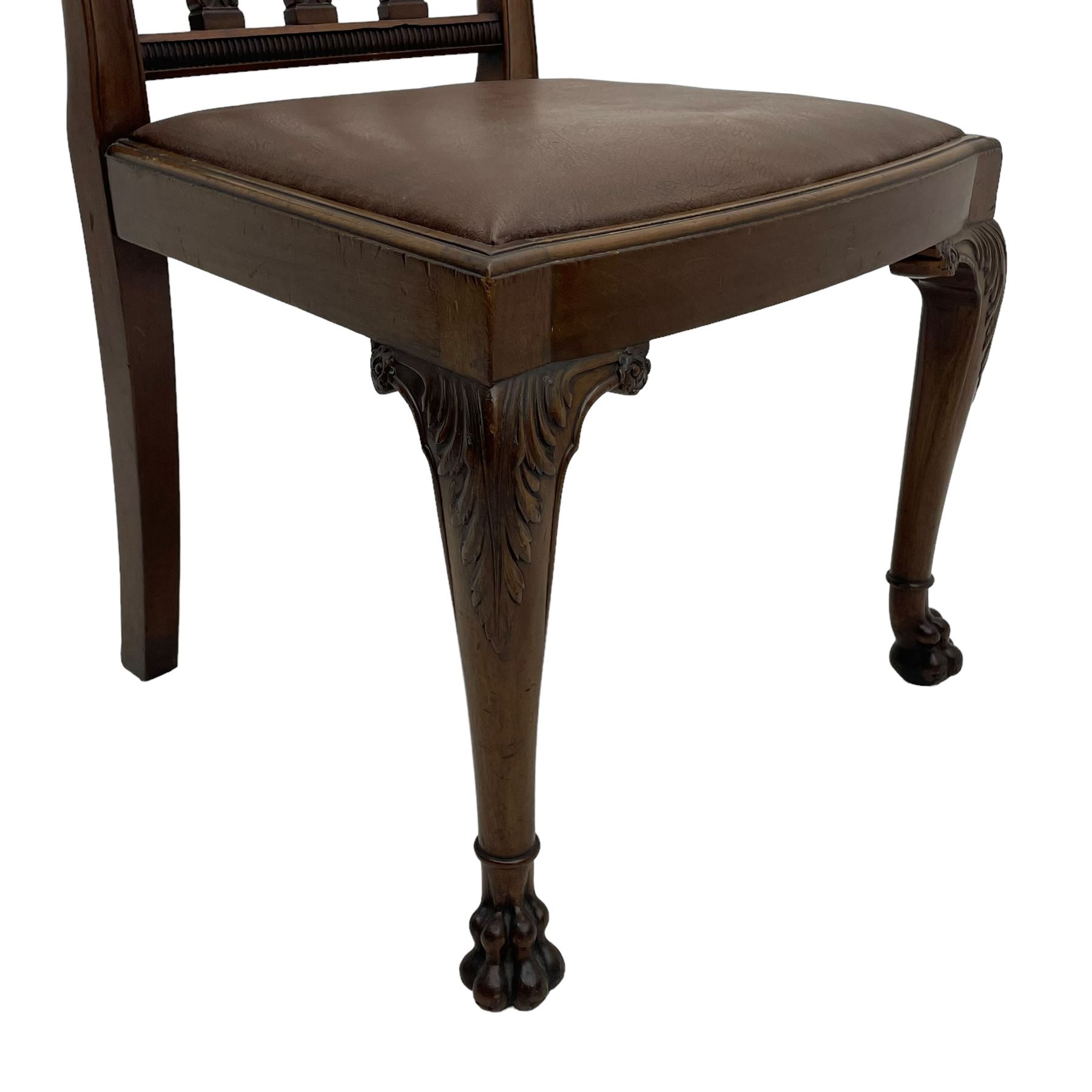 Set of six early 20th century Hepplewhite design mahogany dining chairs, moulded arched frame back, three shaped vertical rails carved with stylised foliate decoration, drop-in seats upholstered in brown fabric within moulded seat rails, on acanthus leaf carved cabriole supports with paw carved terminals 