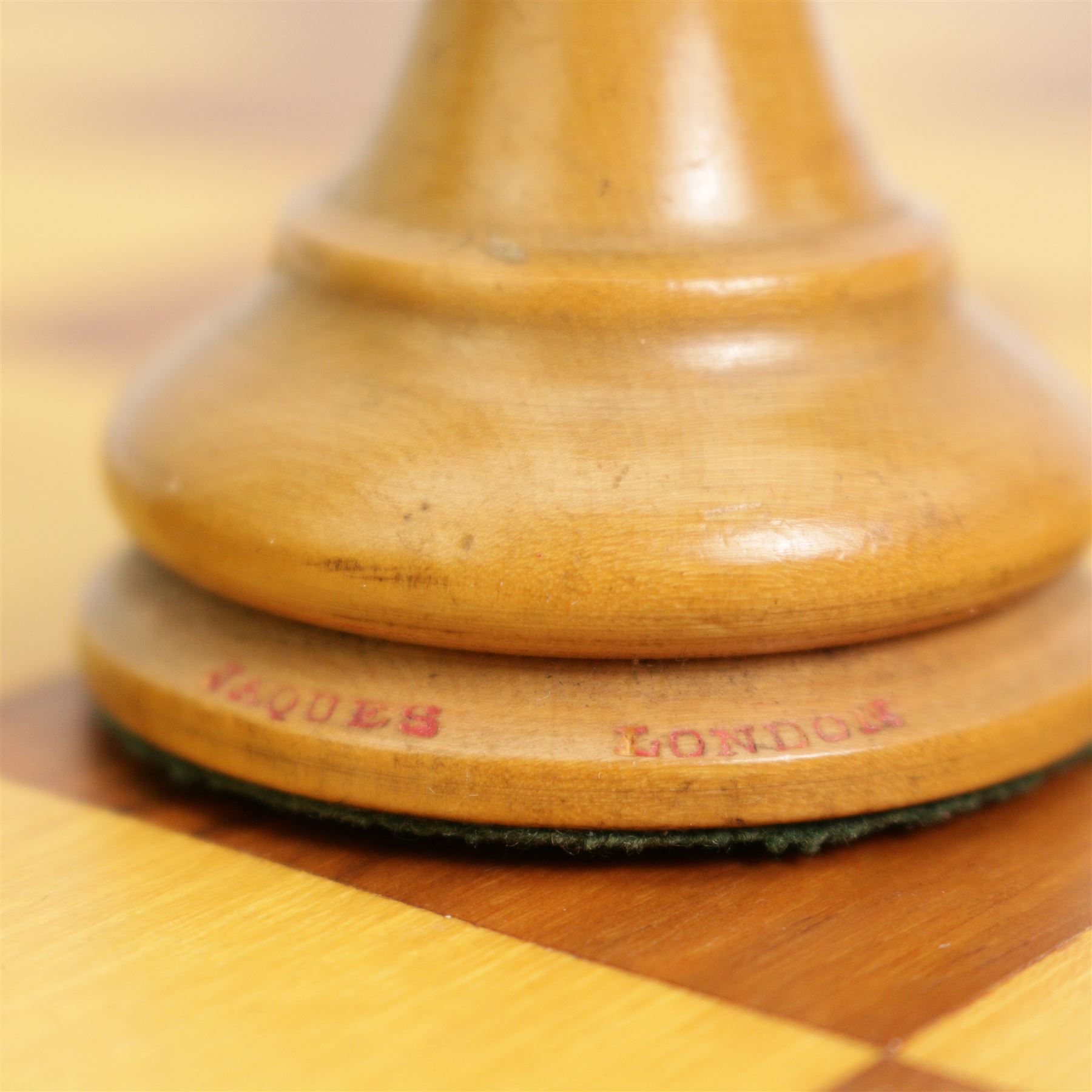 19th century Jaques & Son Staunton pattern boxwood and ebony chess set, kings stamped 'Jaques London', knights and rooks with impressed crown marks, knights possibly Lasker, height of king 9cm, contained in a green baize lined box, together with a later chess board 