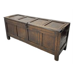 17th century panelled oak blanket chest or kist, quadruple panelled hinged lid over quadruple panelled front, moulded frame and pegged construction, on stile supports