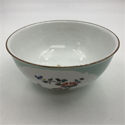 18th century Meissen turquoise ground bowl, circa 1740, decorated with two shaped reserves painted with Kakiemon type flowers, with gilt rim and band to short circular foot, with undergaze blue crossed swords mark to base, H7cm D15.5cm