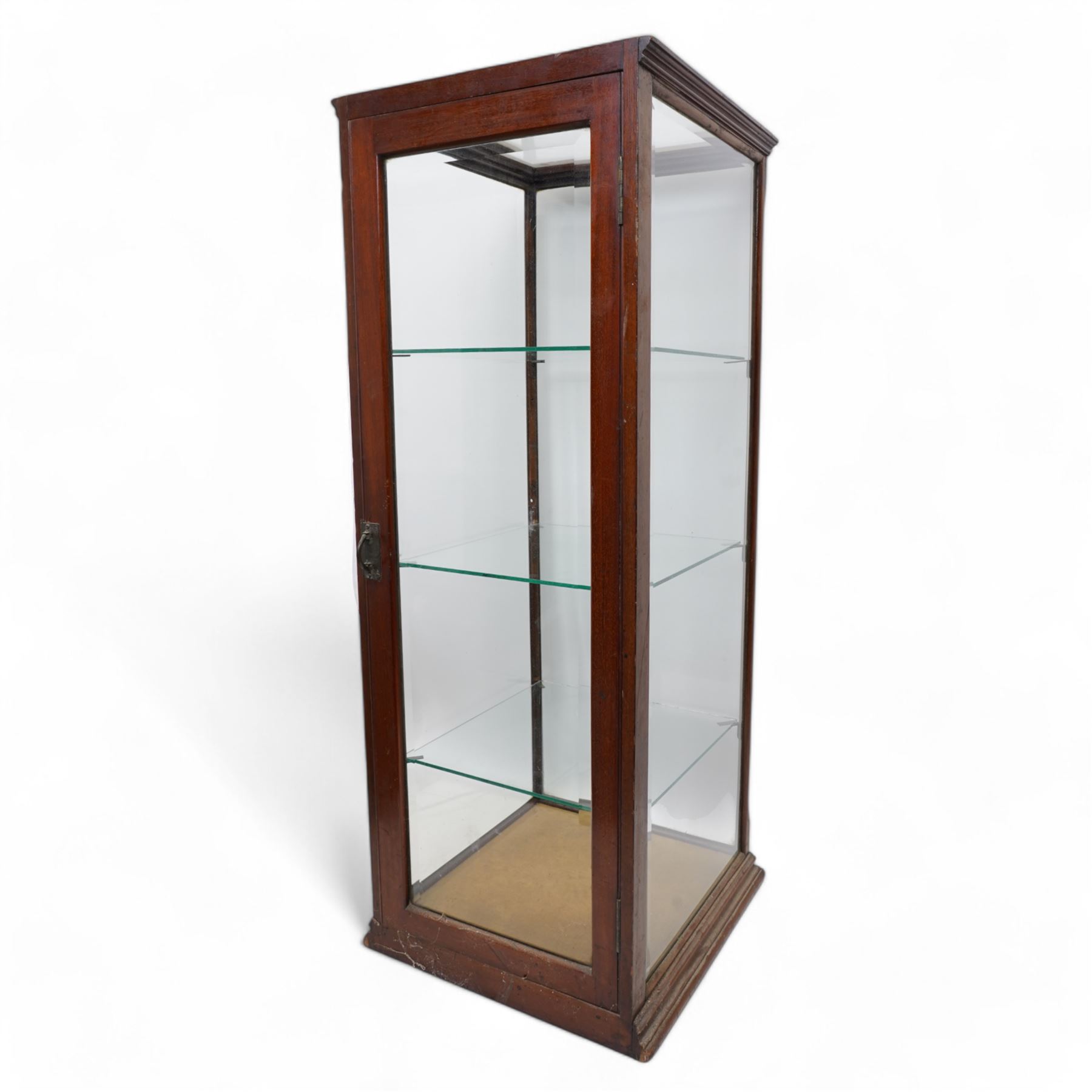 Mid-19th century mahogany five glass counter top display cabinet, moulded cornice over bevelled glass panes, fitted with three glass shelves, moulded plinth base