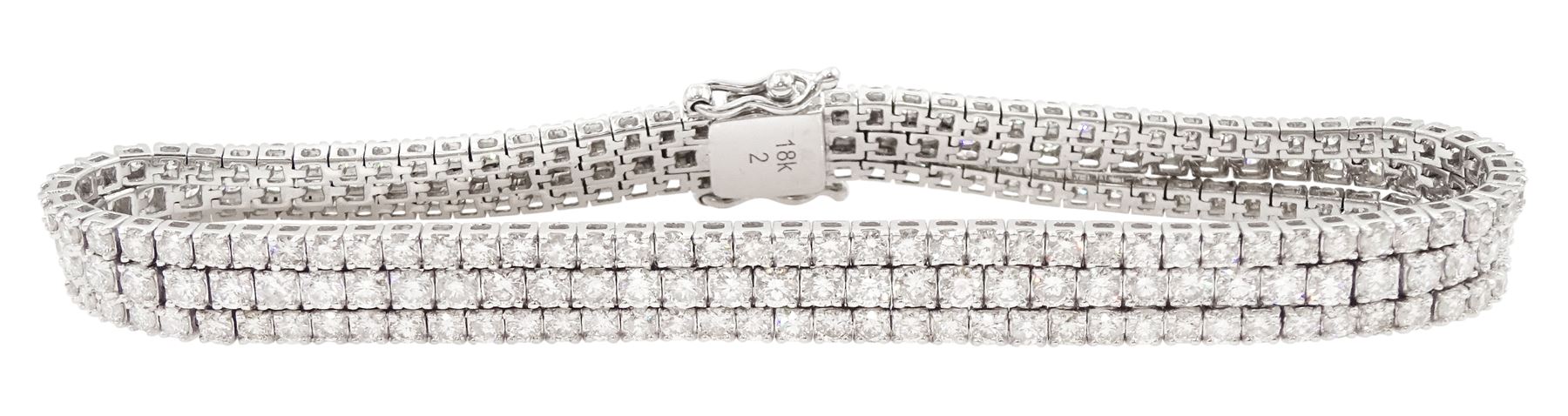 18ct white gold three row round brilliant cut diamond bracelet, stamped, total diamond weight approx 7.70 carat