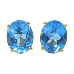 Pair of 18ct gold oval cut Swiss blue topaz stud earrings, stamped 750, total topaz weight approx 5.85 carat