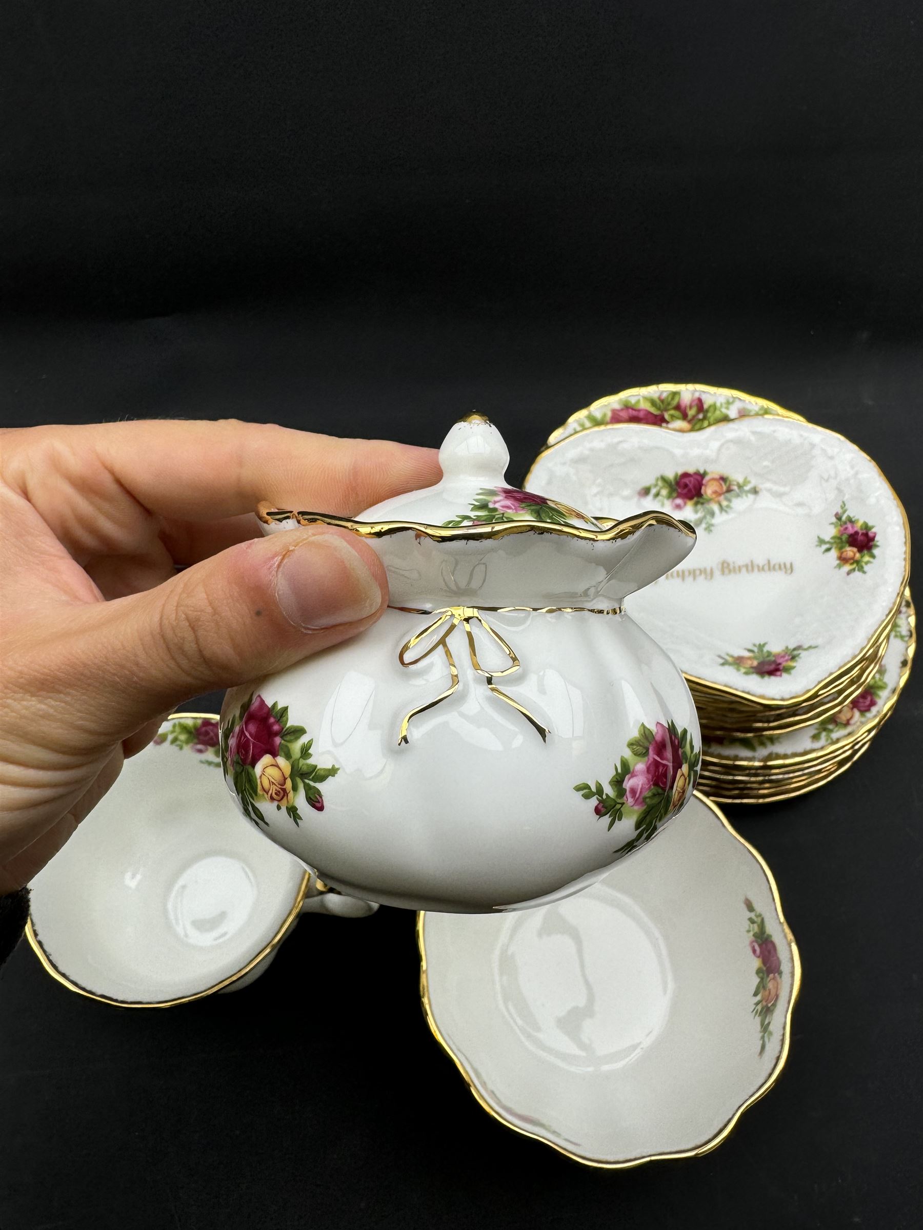 Royal Albert Old Country Roses tea service for six, comprising teapot, milk jug, open sucrier, cups and saucers, dessert plates, two trinket dishes covered jar and clock