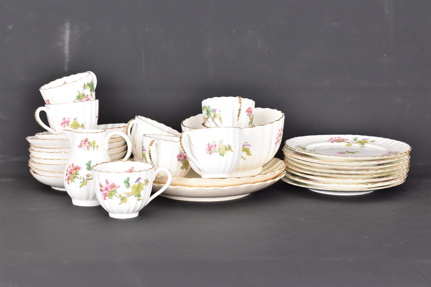 Coalport part tea service, decorated with floral sprigs, including eight cups and saucers, milk jug, eight dessert plates etc  