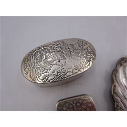 Modern silver oval box, decorated to the removable cover with an owl on a branch, hallmarked London 1984, makers mark KB, together with a modern silver pin tray of scrolling lobed form, hallmarked 1992, makers mark EM, and an early 20th century silver pill box, hallmarked Adie & Lovekin Ltd, Birmingham 1910, oval box H2.2cm, W6.5cm