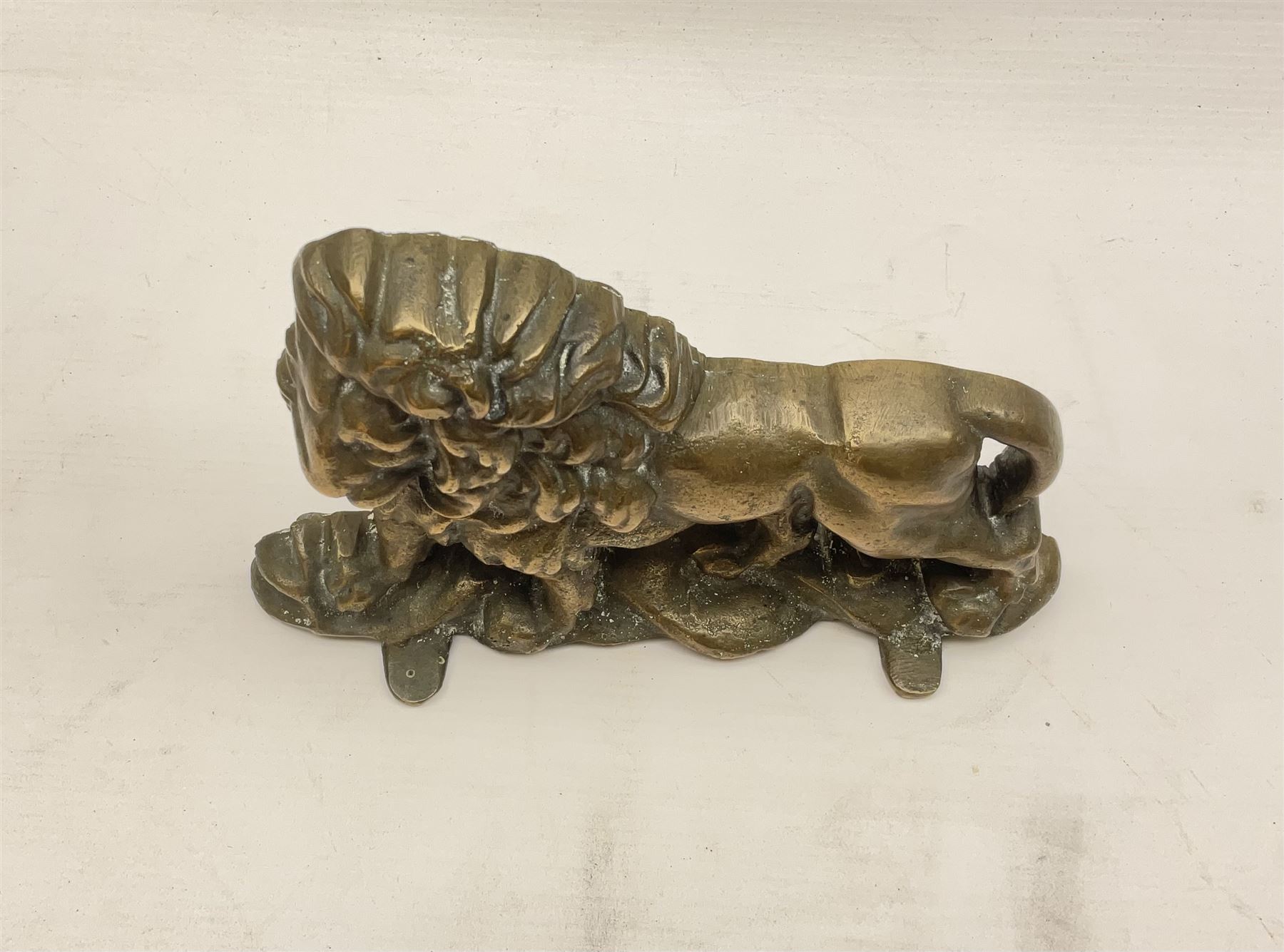 Brass door stop, modelled as a lion, H15cm