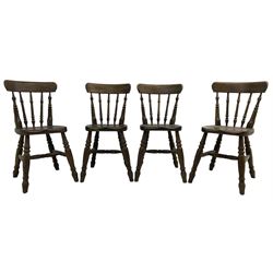 Set of four 20th century oak farmhouse dining chairs, bar cresting rail over turned spindle back, on turned supports united by turned stretchers 
