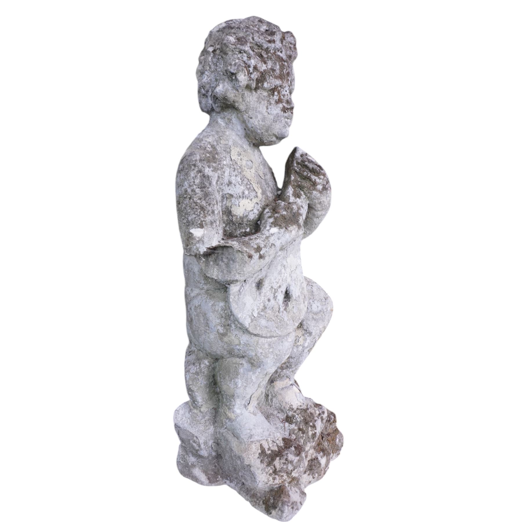 Cast stone figure of a cherub playing a mandolin on rocky base 