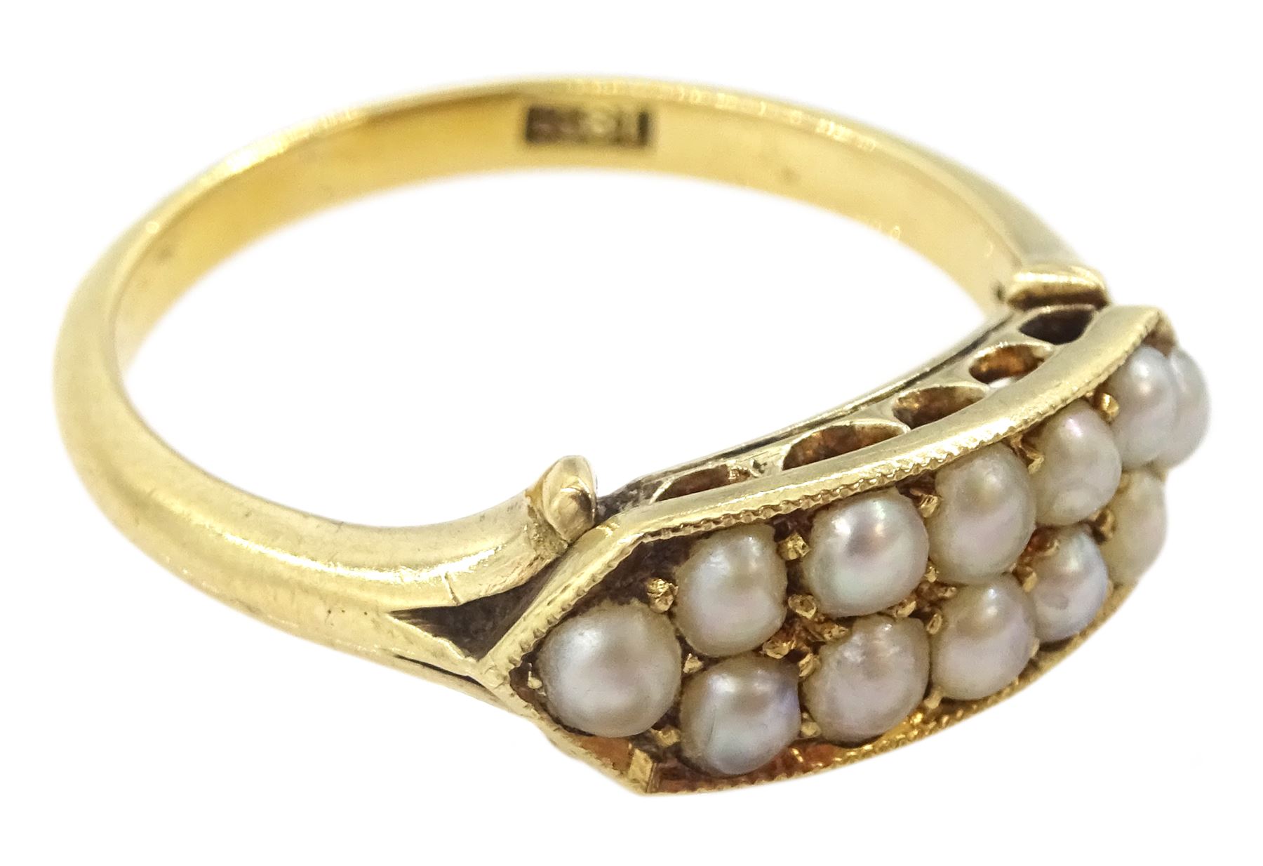 Early 20th century gold milgrain set two row split pearl ring, stamped 18ct