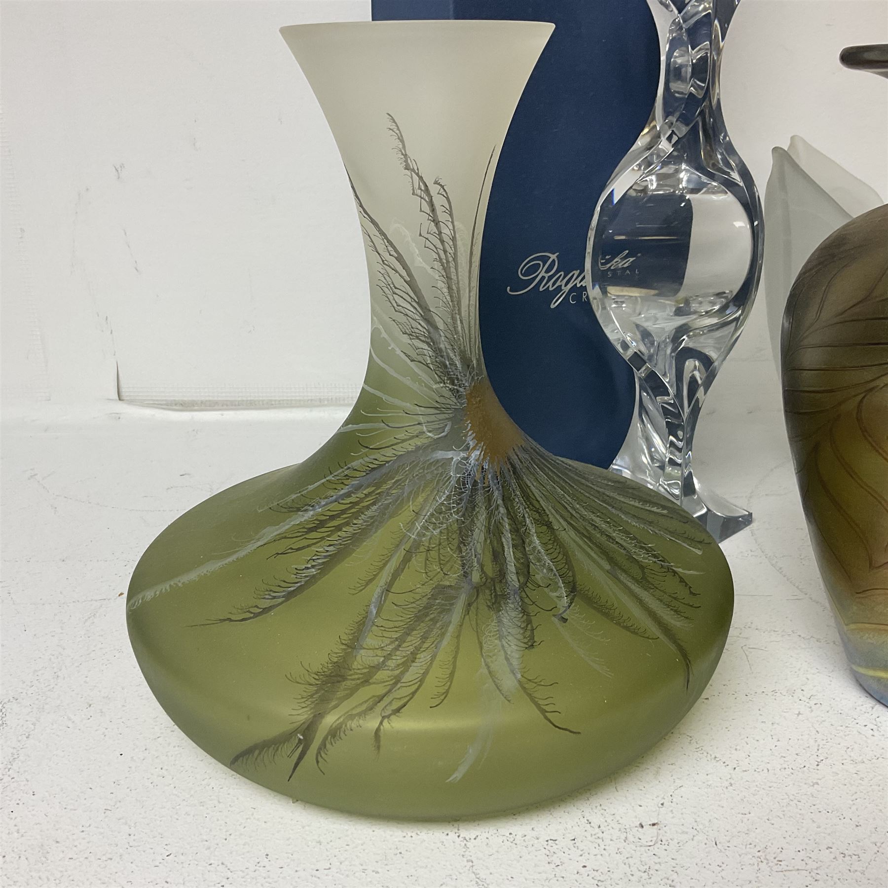 Late 20th century art glass, to include a Robert Held vase, of baluster form with iridescent swirl design, two frosted glass vases with peacock feather design on green and white ground, frosted glass tulip shaped bowl with smoke design and a Rogaska Crystal cobra candlestick, tallest vase 27cm