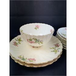 Coalport part tea service, decorated with floral sprigs, including eight cups and saucers, milk jug, eight dessert plates etc  