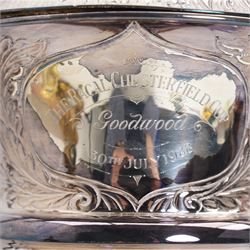 'The Racal Chesterfield Cup, Goodwood 30th July 1988' - Edwardian silver two handled cup and cover with scroll handles and leaf decoration on wooden base H52cm overall Birmingham 1908 Maker Jones & Crompton