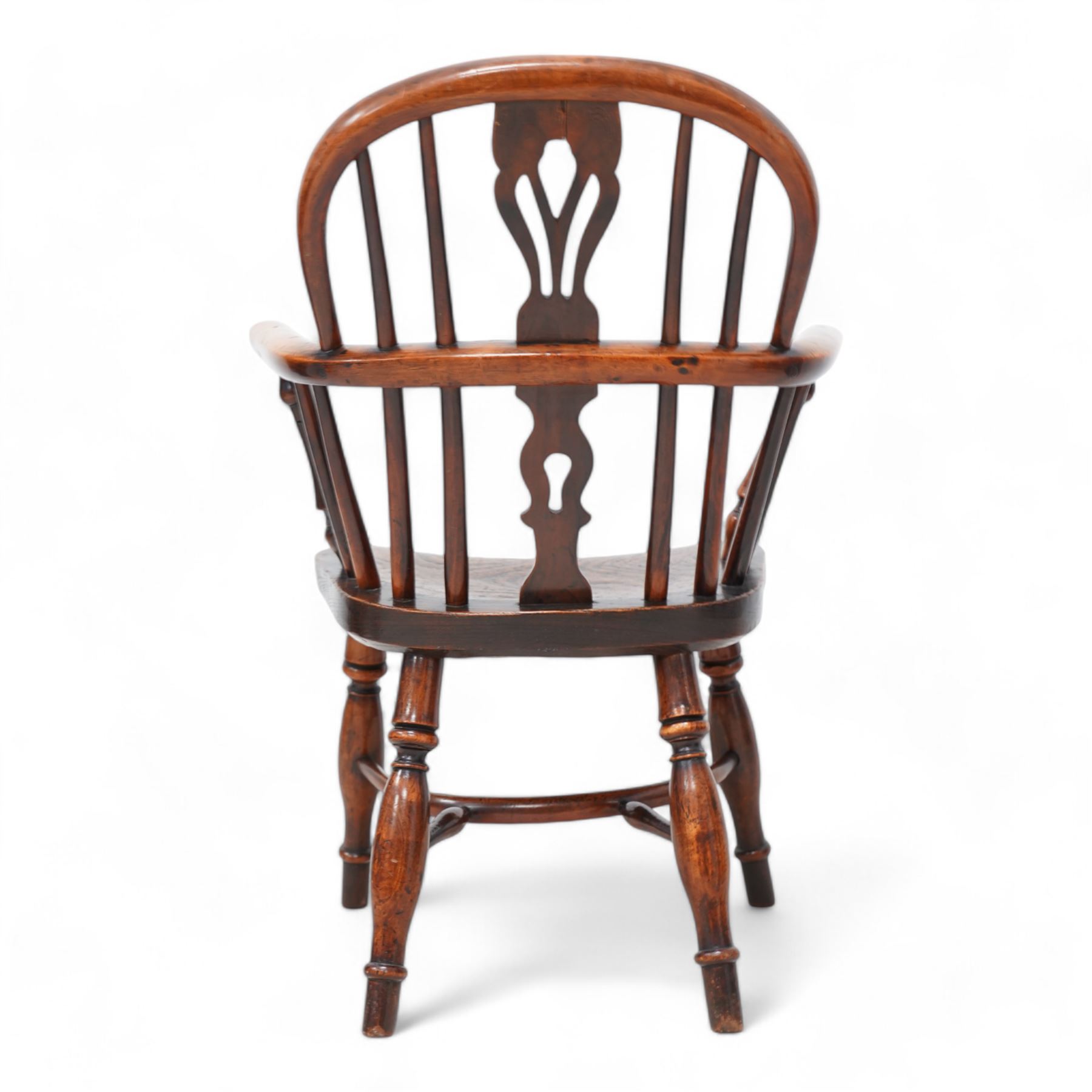 19th century yew wood and elm Child's Windsor armchair, double hoop and stick back with pierced splat, dished seat on turned supports united by crinoline stretcher, impressed maker's mark beneath 'V' 