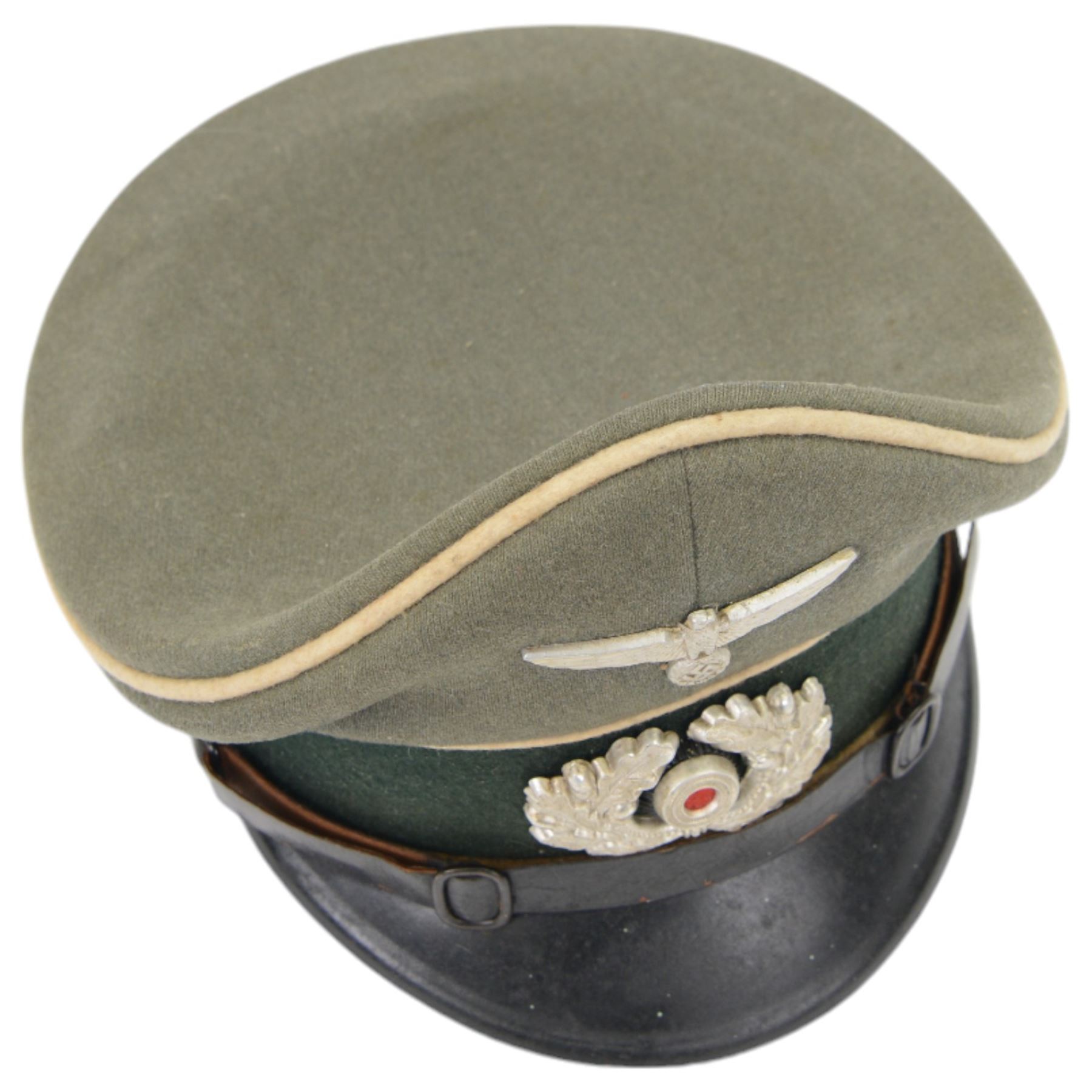 WWII German, Third Reich army NCO visor cap, green doeskin wool with a forest green centreband and cream piping, featuring a silver alloy army eagle and a silvered wreath