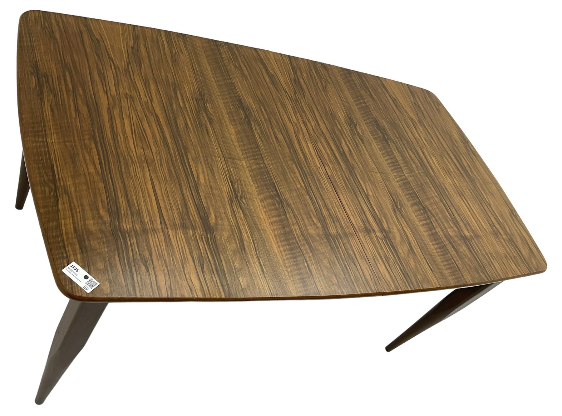 Mid-20th century figured walnut extending dining table, pull-out action with fold-out leaf, on tapering supports 