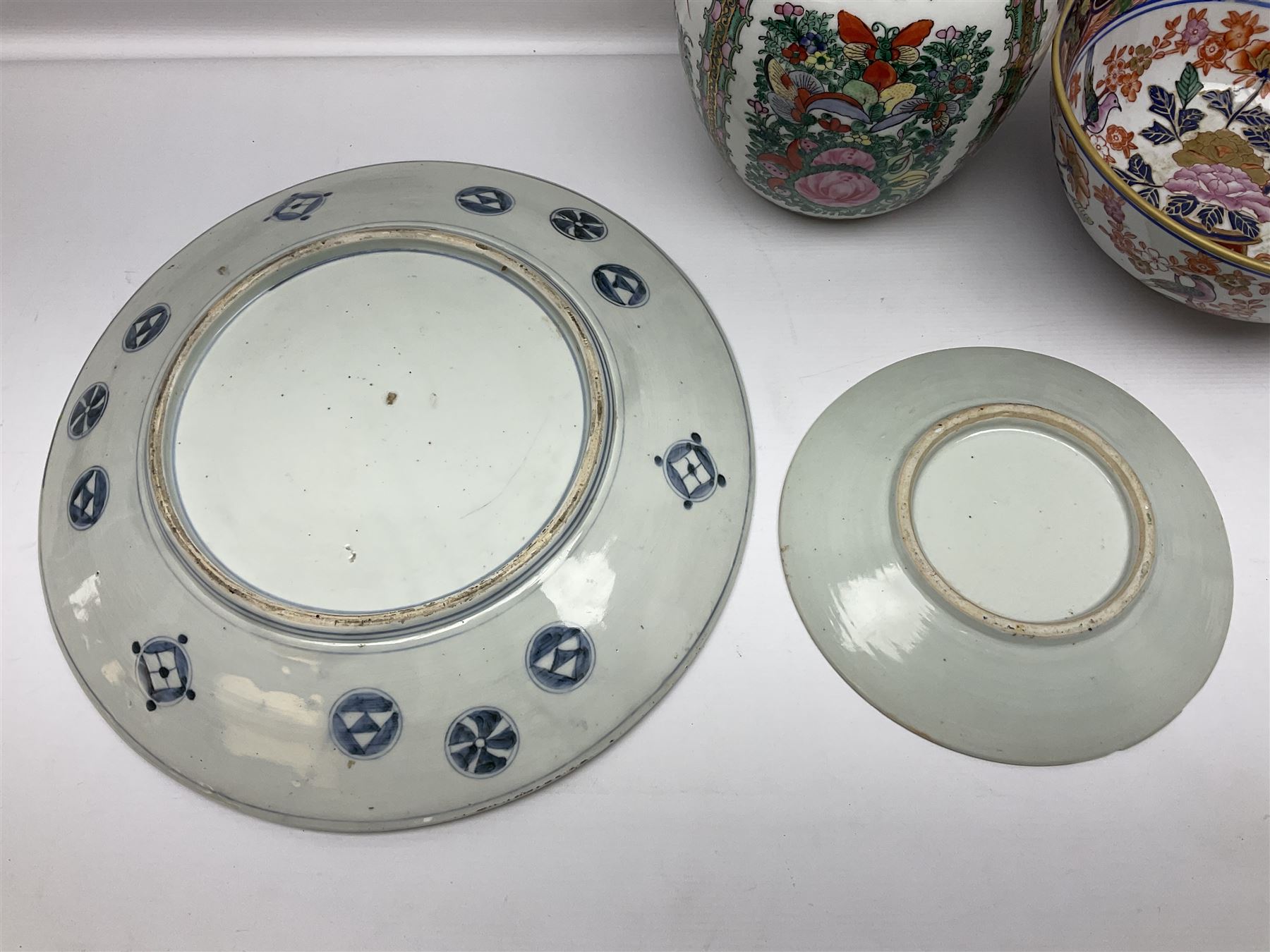 19th century and later Chinese ceramics, to include charger, with hand painted floral and foliate decoration, footed bowl, decorated in enamel with birds amongst prunus blossom,  a smaller plate decorated with figural panels and a ginger jar with cover, with hand painted floral decoration and four character marks beneath, charger D40.5cm