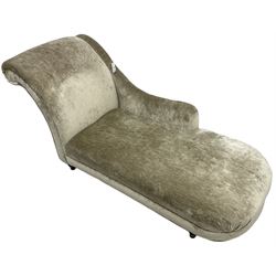 Contemporary chaise longue with scrolled back, upholstered in champagne crushed velvet, on turned feet