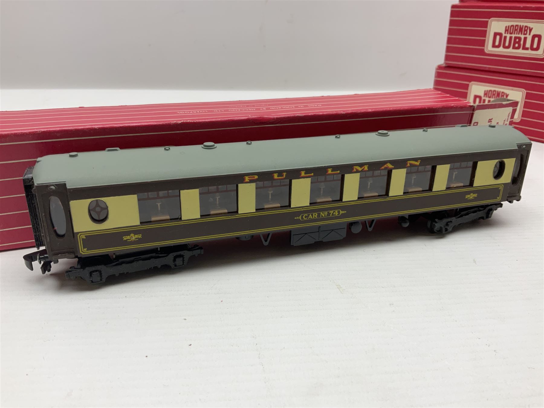 Hornby Dublo - 2-rail, seven passenger coaches - 4035 Pullman Car Aries 1st Class, two 4036 Pullman Car 2nd Class, 4037 Pullman Car Brake/2nd, 4052 Corridor Coach, 4053 Corridor Coach and 4063 Open Corridor Coach; together with fifteen various wagons; all boxed (22)