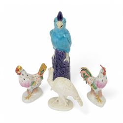 Pair of Continental cockerel and hen figures, Nymphenburg white glazed figure of a turkey ...