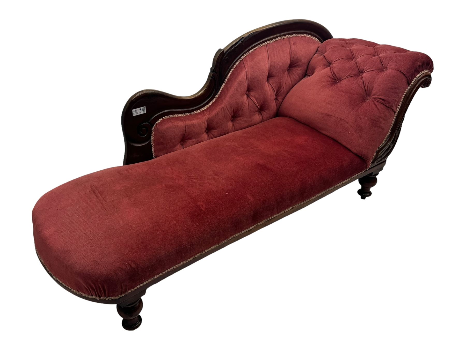 Victorian mahogany framed chaise longue, upholstered in pink velvet, the scrolled back with button-tufting, on turned feet