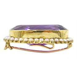 Early 20th century gold large oval cut amethyst and seed pearl brooch, stamped 15ct