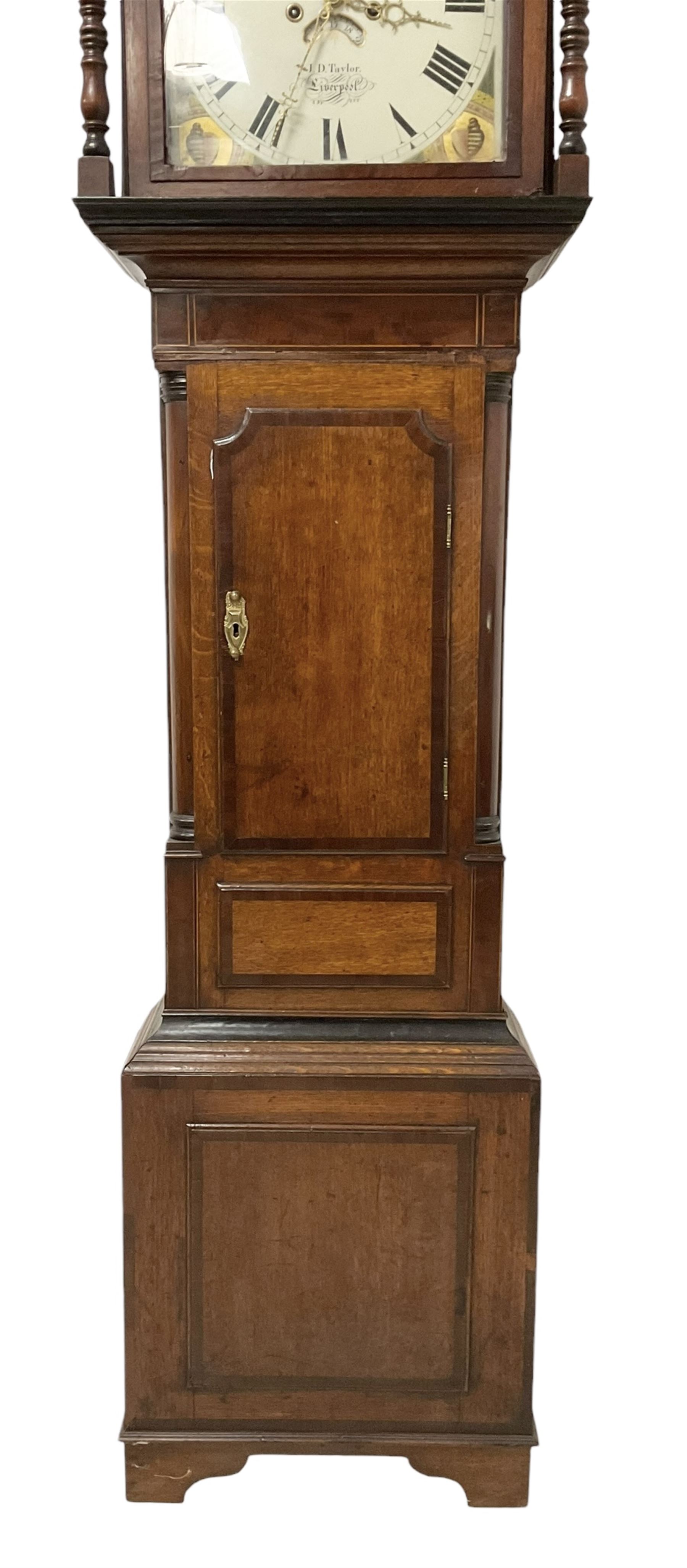 Taylor of Liverpool - mid 19th century 8-day Oak and Mahogany longcase clock with a swans necked pediment and brass ball finial, with a square hood door beneath flanked by turned pilasters, trunk with a short crossbanded door and raised panel on a square plinth raised on bracket feet, painted dial with matching geometric spandrels including depictions of conche shells, Roman numerals, makers name, axe moon disc and calendar aperture, dial pinned via a false plate to a rack striking movement, striking the hours on a bell. With weights and pendulum.