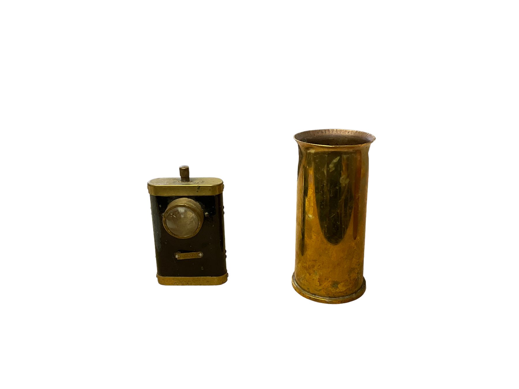 Ever Ready lamp, together with horse brasses, shell cases and other items, in two boxes 