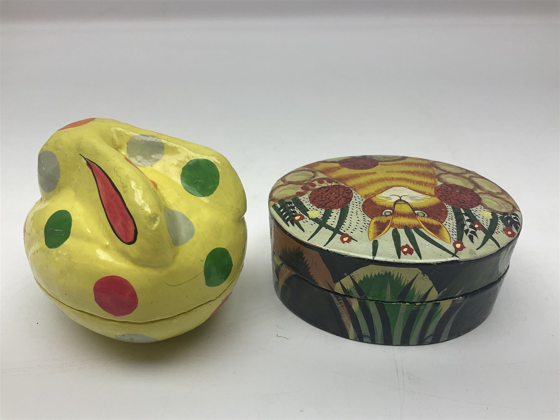 Eight lacquered boxes, including novelty painted boxes in the form of cats, rabbit and a bird, rabbit H7cm, L9cm