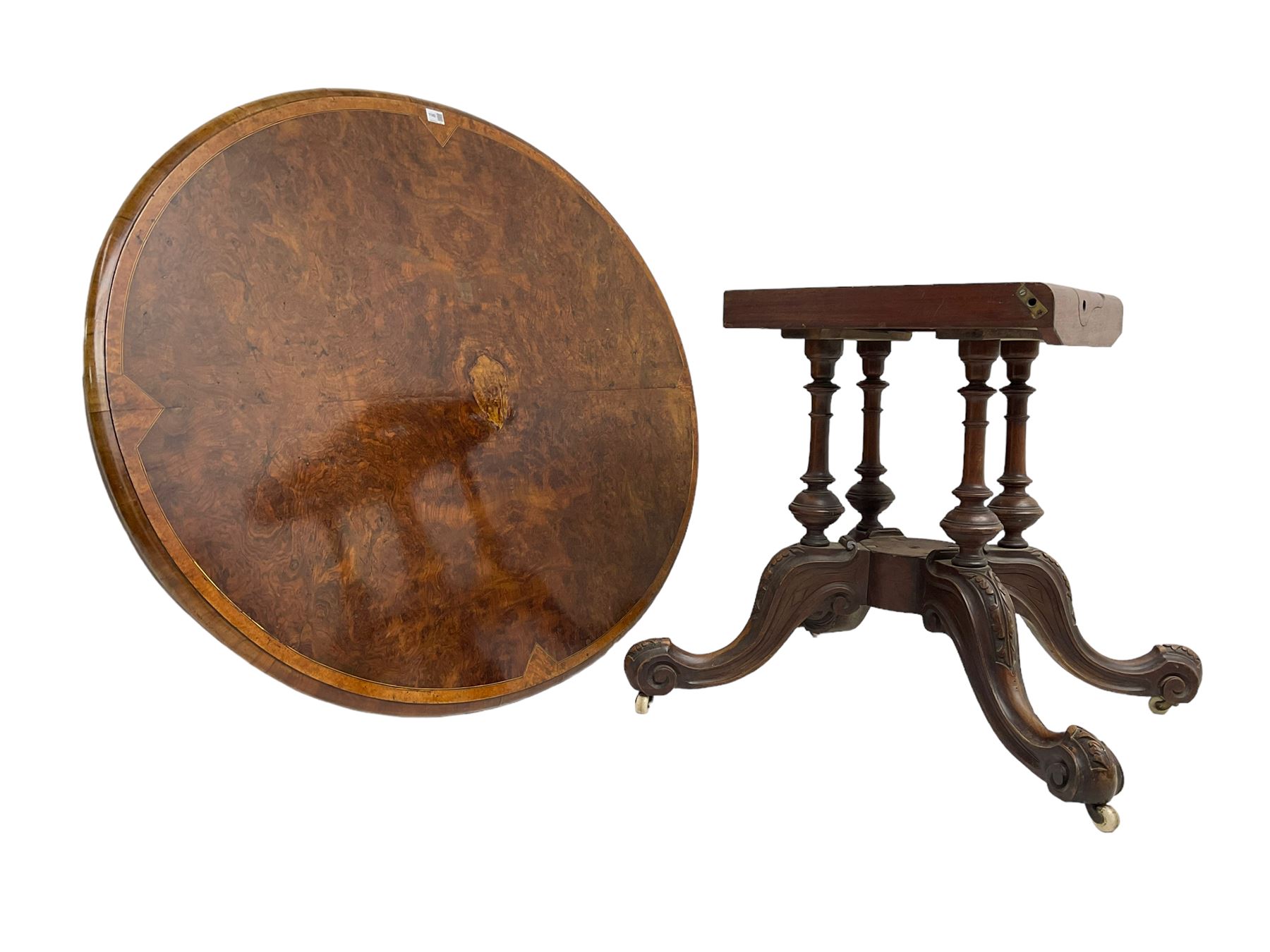 Victorian figured walnut loo table, oval moulded top with quarter matched veneers, on quadruple turned pillar base, acanthus carved splayed supports with scrolled terminals