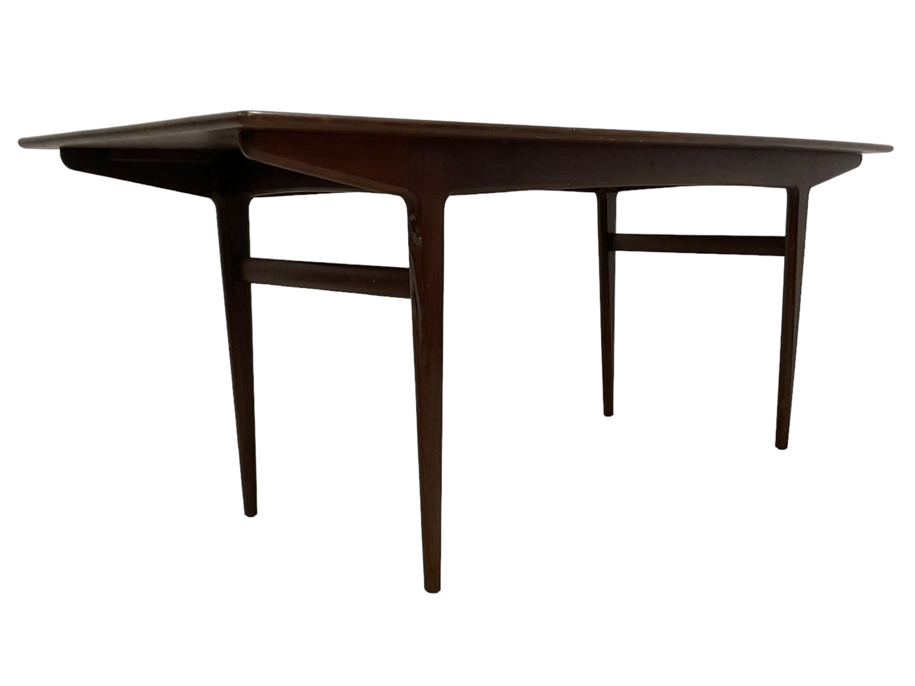 John Herbert for A Younger - mid-20th century teak dining table, curved rectangular top on tapering supports 