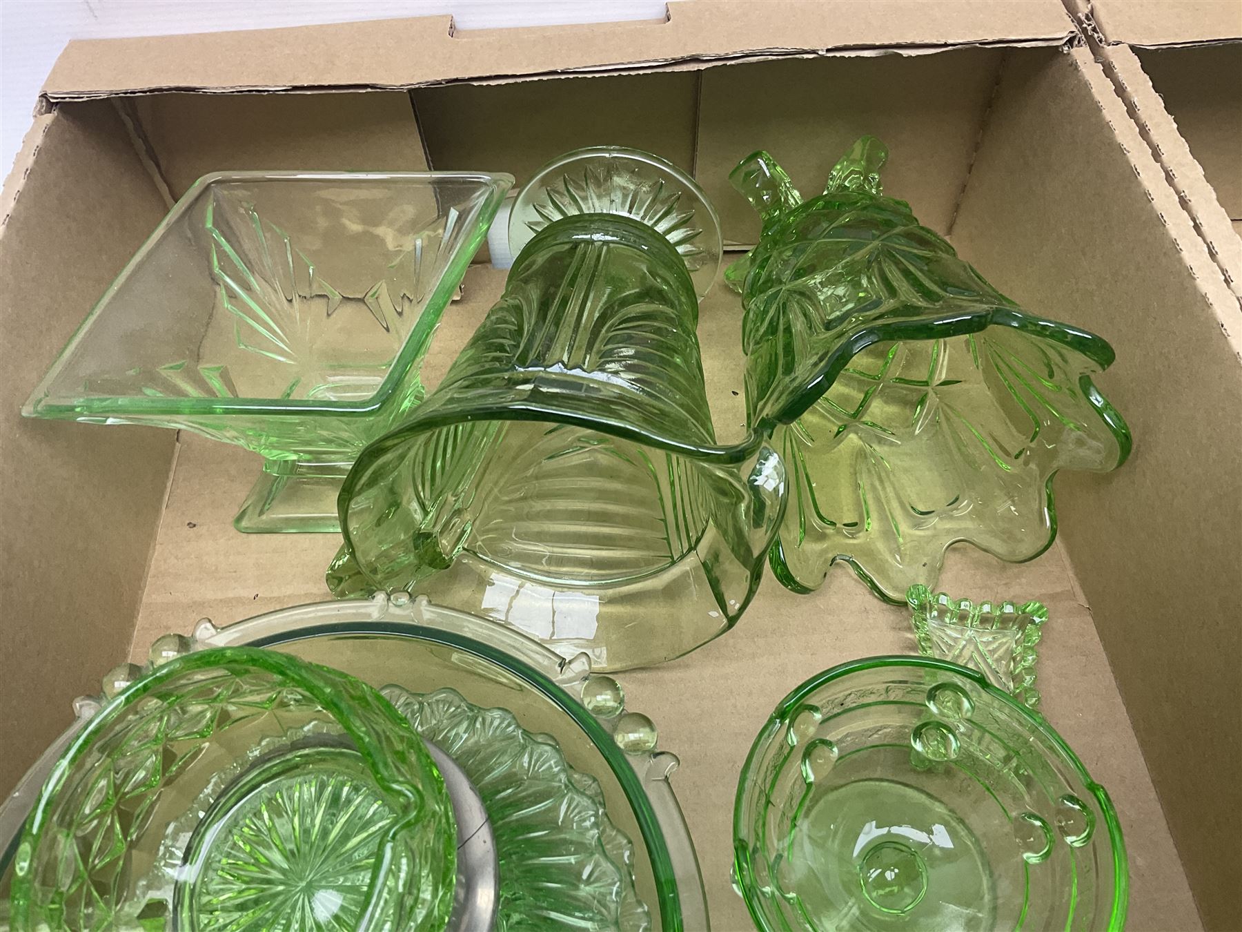 Art Deco green glass ware, including jugs, vases, bowls etc, together with a small blue Sylvac rabbit