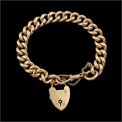 9ct gold curb link chain bracelet, with heart locket charm