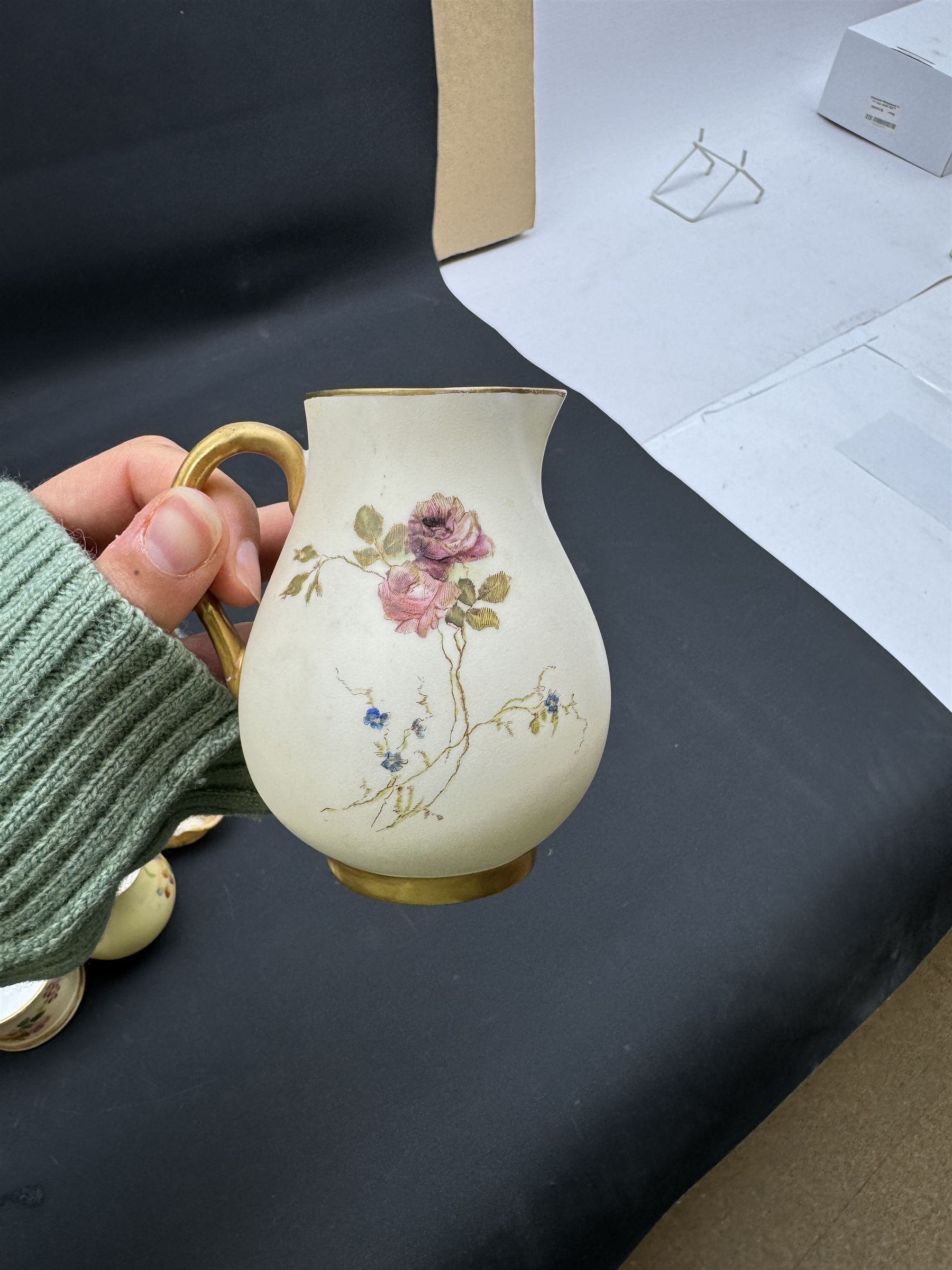 Collection of Royal Worcester blush ivory ceramics, including a graduating set of posey baskets, miniature flatback jug, covered jars etc (19) 