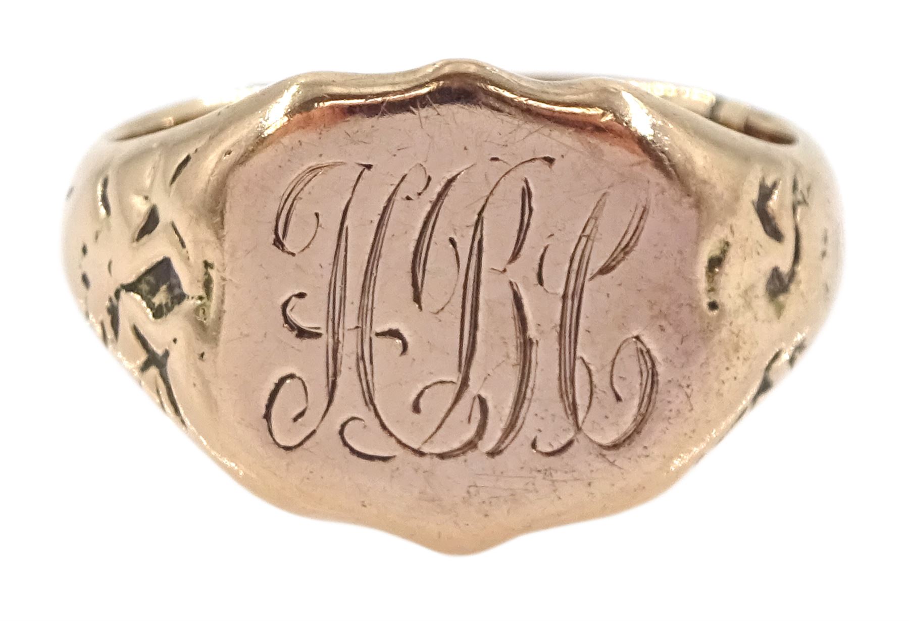 Early 20th century 9ct rose gold shield design signet ring, with engraved monogrammed initials, Chester 1921