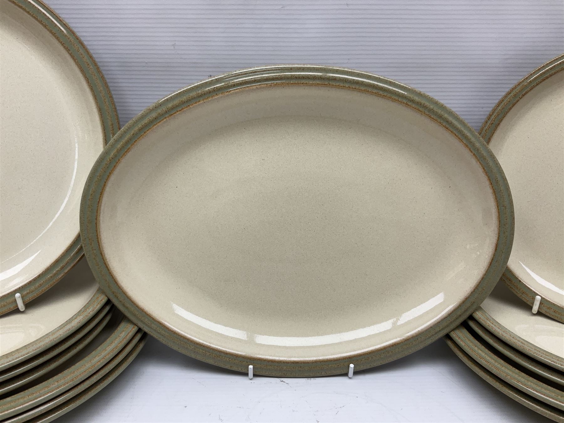 Denby tea and dinner wares, including bowls, jugs, tureens, side plates, dinner plates, serving dishes, cups and saucers, coffee pot, etc, all decorated with a green and brown mottled glaze, with printed marks beneath, in two boxes 