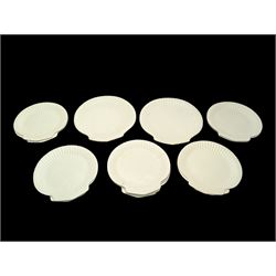 Wedgwood scallop shell plates, in white glaze, with printed marks beneath